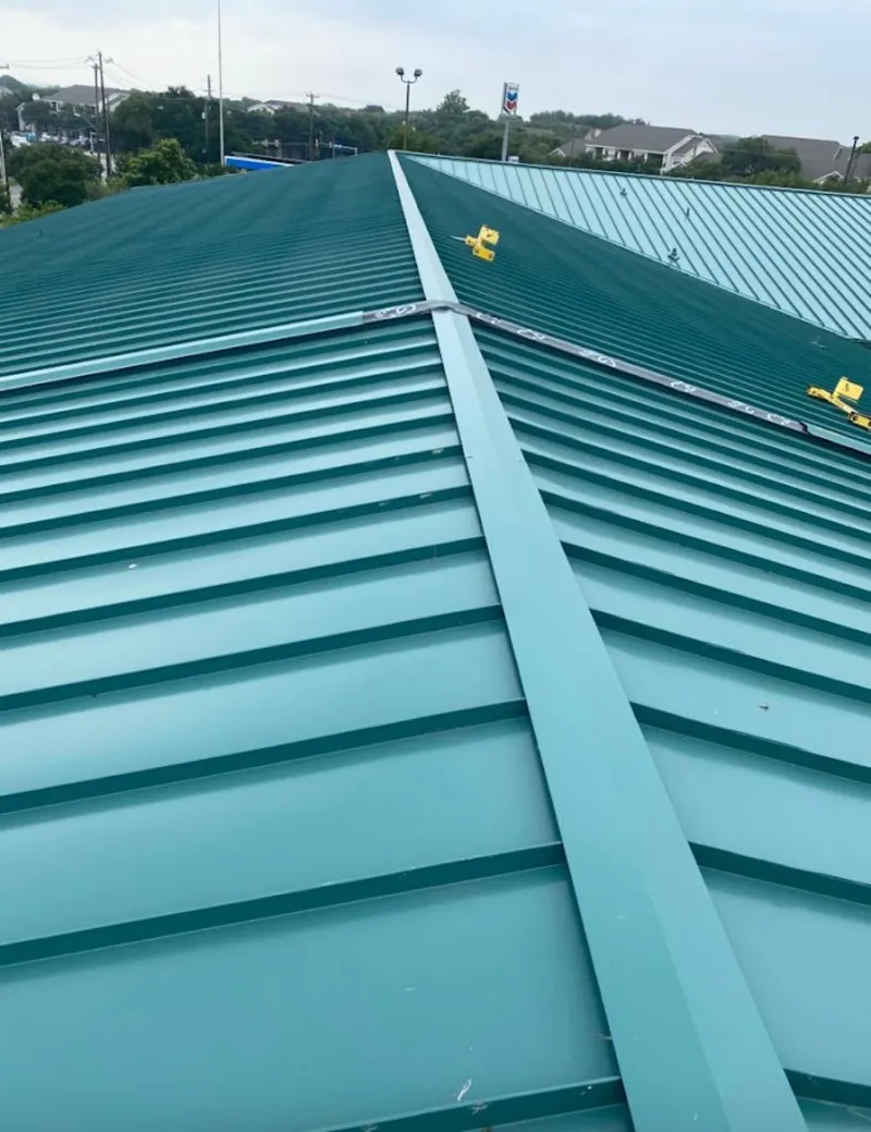 Green commercial metal roof ridge and valley for Metal Roof Repair in Carrollton